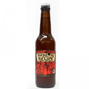 Bouteille de Reuze Triple 33 cl face, mousse généreuse et étiquette du Mont Cassel